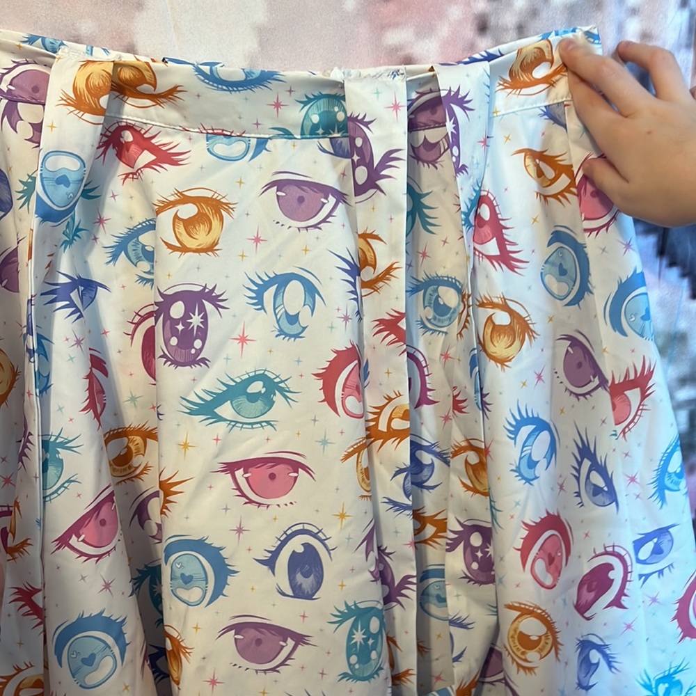 Anime eye above the knee skirt with suspender straps. White. cute for layering.